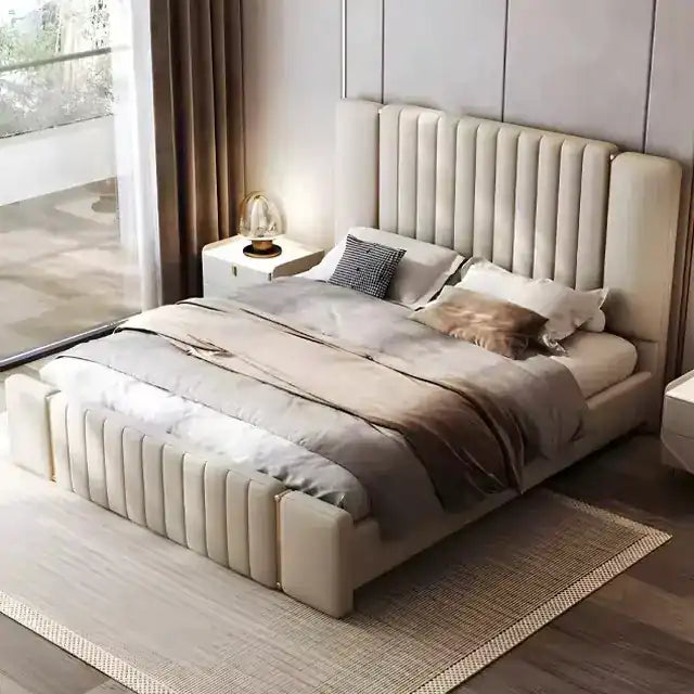 double bed shown in a spacious bed layout with tall padded headboard