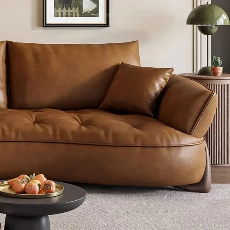 Full front view of Sablon leather sofa set with luxury sofa set aesthetics, leather couch comfort, deep tufted cushions, designer couch details, modern sofa styling and 2 seater sofa configuration