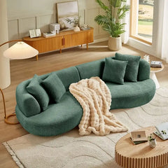 lounge sofa with textured boucle-style upholstery and rounded edges, side profile