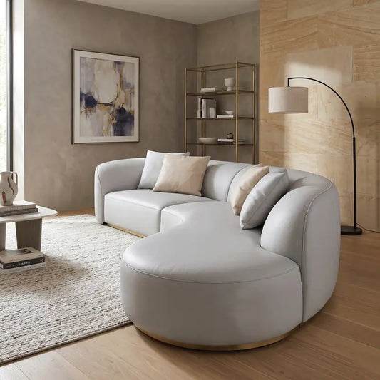 curved sofa with plush supportive cushioning and smooth rounded profile, side profile