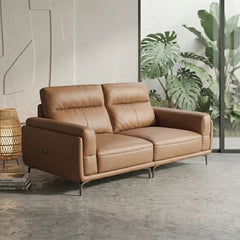 Leatherette sofa with wide padded arms and elevated metal legs, left-side view