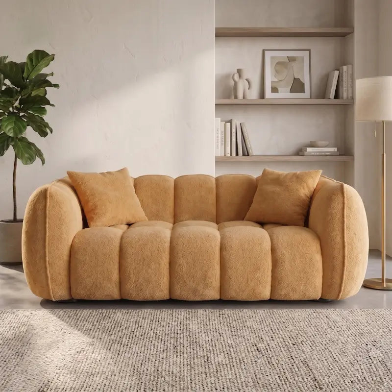 boucle sofa with rounded armrests with integrated plush cushioning, side profile