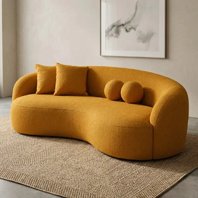 Luxury sofa with deep lounge seating and rounded arms, left-side view