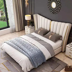 upholstered bed shown in a spacious bed layout with wide padded headboard alternate front angle