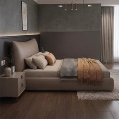 low profile platform bed shown with a balanced mattress layout with curved padded headboard alternate front angle