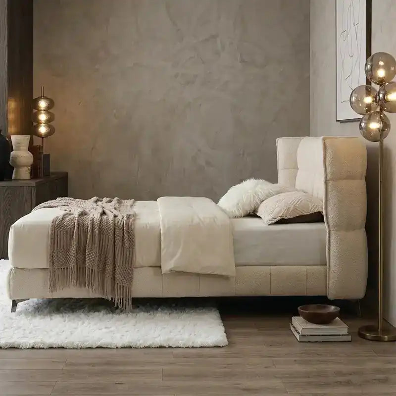 hydraulic storage bed shown with a balanced mattress layout with thick padded headboard alternate front angle