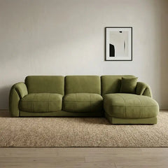 3 seater sofa with panel stitching and rounded organic arm curves, seating close-up