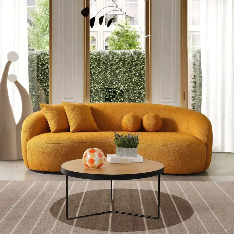 Lounge sofa with deep lounge seating and rounded arms, right-side view