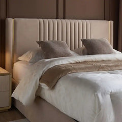 tufted bed shown with a balanced mattress layout with soft padded headboard