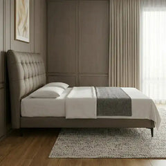 bed with tufted headboard showing the lift-up storage area with button-padded headboard