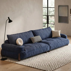 plush sofa set with dark wooden side legs and contrast detailing, seating close-up