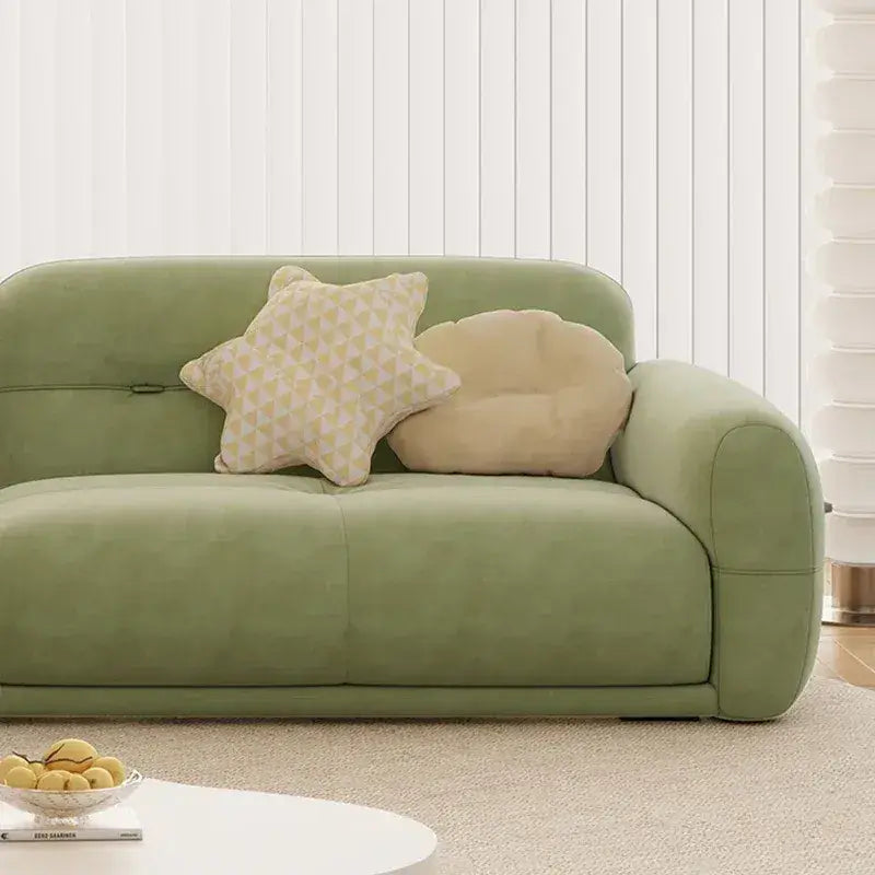 sofa set online with panel-stitched seats, pillow arms and a wide four seater arrangement