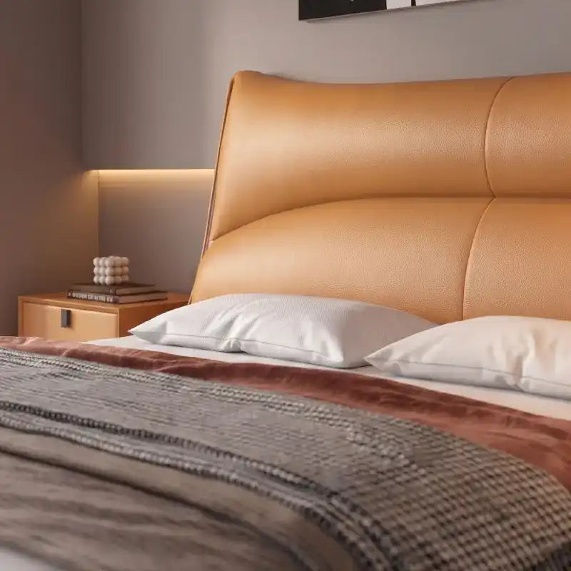 modern luxury bed front view showing the complete bed frame with wide padded headboard