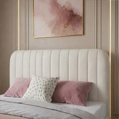 low profile platform bed shown in a compact double-bed layout with rounded padded edges