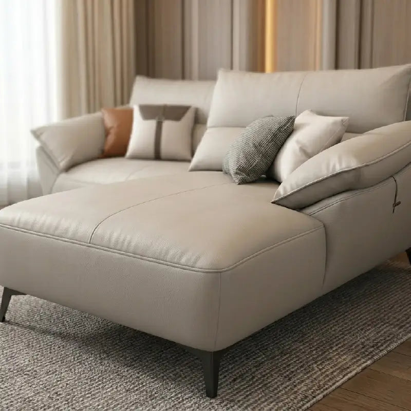leatherette sofa with side angle showing raised floor clearance, armrest close-up