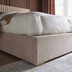 upholstered bed with headboard shown in a spacious bed layout with soft padded headboard alternate front angle