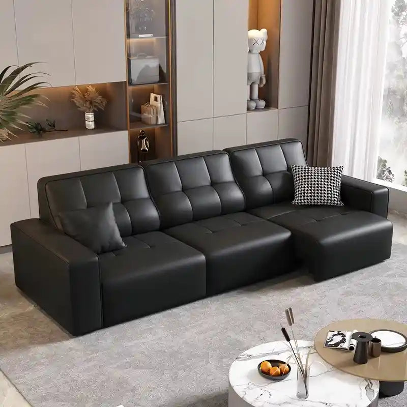 faux leather 3 seater sofa bed showing the built-in storage compartment with padded arms