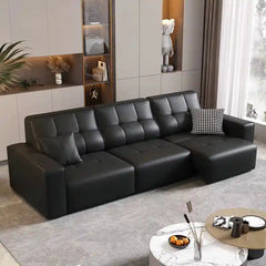faux leather 3 seater sofa bed showing the built-in storage compartment with padded arms