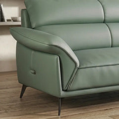 Leatherette sofa with deep lounge seating and soft back cushions, full seating layout