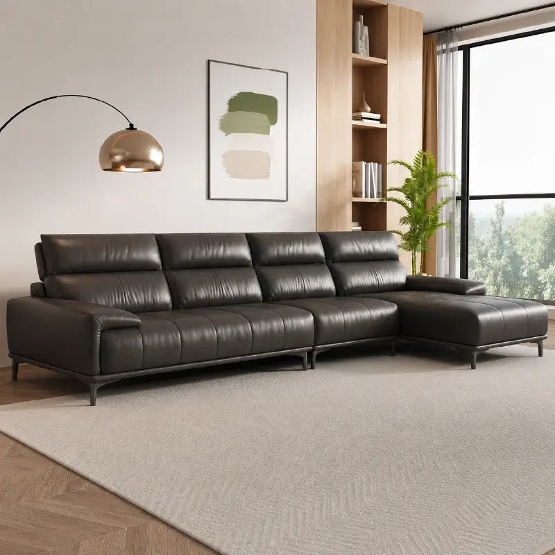 Leatherette sofa with deep cushions and segmented back support, close-up of seat cushions