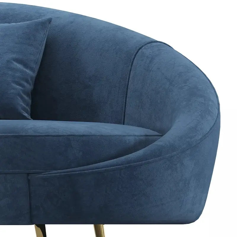 Curved sofa set with curved backrest and gold-finish legs, close-up of seat cushions