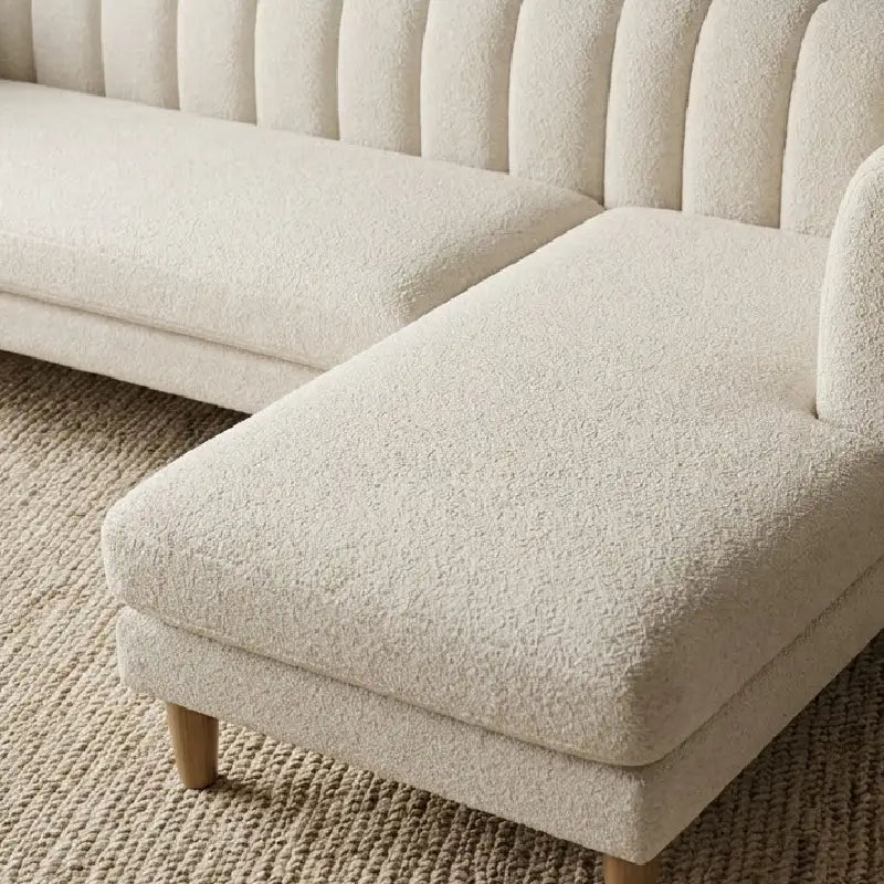 leatherette sofa set with two-seater configuration with elevated wooden legs, backrest detail
