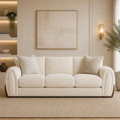 L shape sofa with curved arms and wooden accent details, close-up of seat cushions
