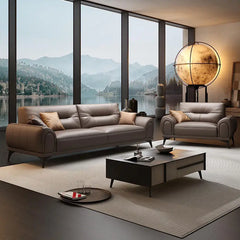 Leatherette sofa with rounded padded arms and elevated legs, close-up of seat cushions