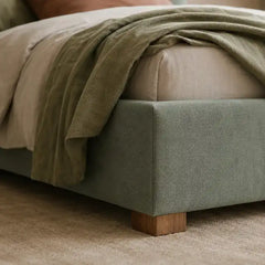 platform bed shown in a compact double-bed layout with rounded arch headboard