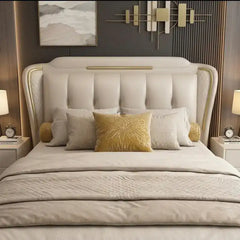 upholstered bed showing the lift-up storage area with stitched padded headboard