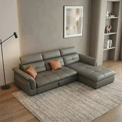 leatherette sofa bed showing the built-in storage compartment with storage lounger