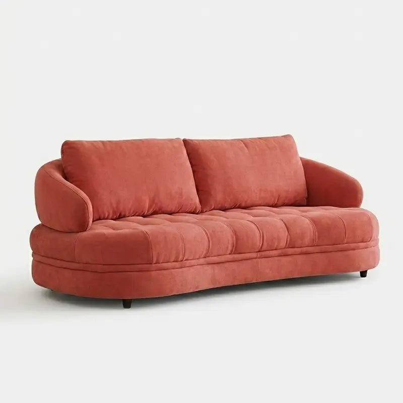 plush 3 seater sofa with a broad straight profile, rounded arms and deep channel-tufted seating