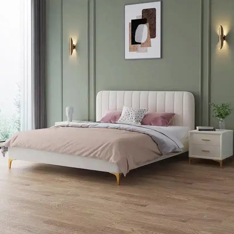low profile platform bed shown in a spacious bed layout with rounded padded edges
