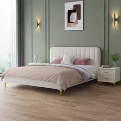 low profile platform bed shown in a spacious bed layout with rounded padded edges