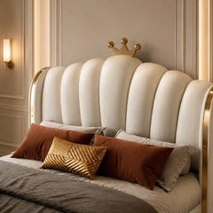 bed with headboard shown in a spacious bed layout with vertical padded panels alternate side angle