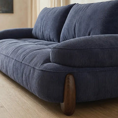 plush sofa with seat and back cushion close-up, upholstery close-up