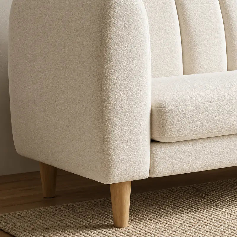 leatherette sofa with lounger configuration with supportive backrest, upholstery close-up