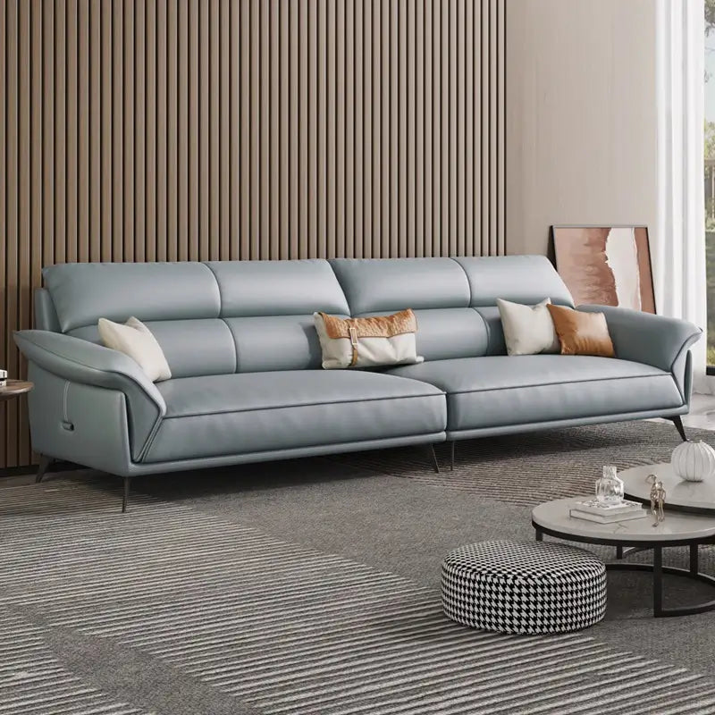 Leatherette sofa with deep lounge seating and soft back cushions, close-up of back cushions