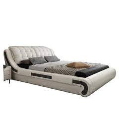 leatherette bed close view of the upholstery and stitching with deep padded headboard