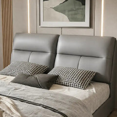 upholstered storage bed shown in a compact double-bed layout with cushioned headboard alternate front angle
