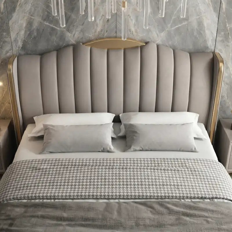 luxury bed shown in a spacious bed layout with wide side-panel headboard alternate side angle