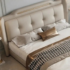 leatherette bed showing the lift-up storage area with deep button-padded headboard