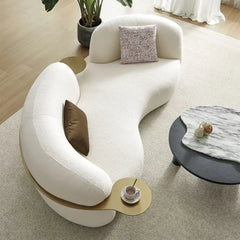 luxury sofa set with integrated gold-toned side tables and plush seating, three-quarter view