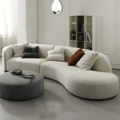 curved sofa set with matte fabric texture and refined seam detailing, close-up