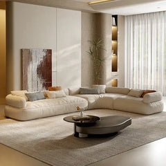 Corner sofa with spacious five-seater curved layout, left-side view
