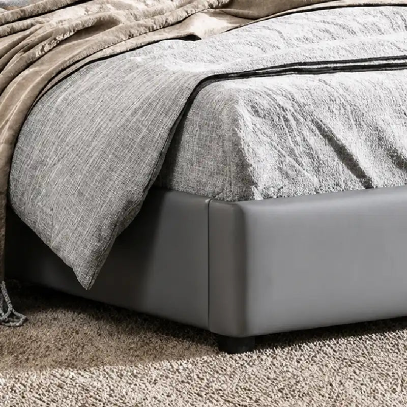 hydraulic storage bed showing the lift-up storage area with cushioned headboard alternate side angle