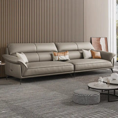 Leatherette sofa with deep lounge seating and soft back cushions, upholstery texture detail
