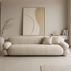 Corner sofa set with deep cushions and oversized back support, upholstery texture detail