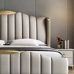 wingback bed showing the lift-up storage area with wide side-panel headboard