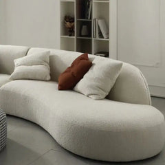 curved sofa with full rounded seating configuration, full view